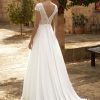 Rückenansicht Boho & Vintage Brautkleid mit Knopfleiste und tiefer Rückenpartie